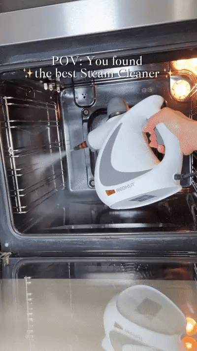 Person using a Redhut steam cleaner inside an oven with text overlay.